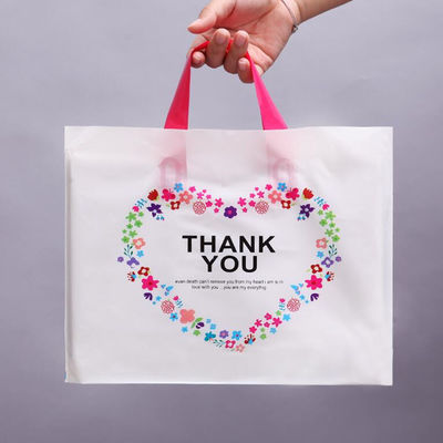 カスタマイズされる子供のための小売りの買い物袋は運ぶこと容易なハンドルが付いている使い捨て可能なプラスチック ギフト袋を印刷します